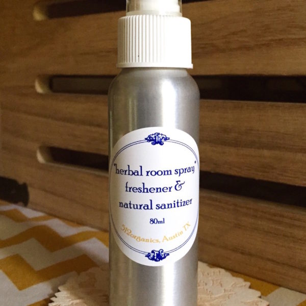 512organics bottle of herbal room spray on laser cut wood