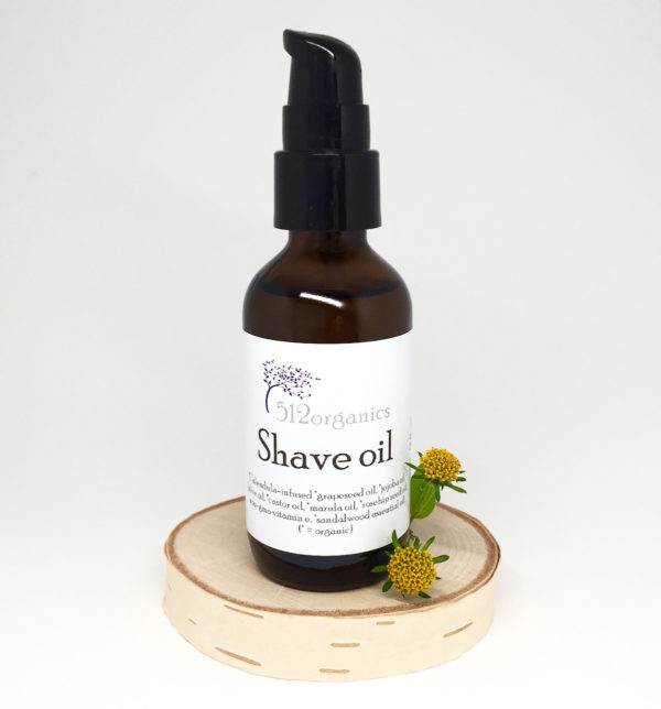 512organics bottle of shave oil with flowers